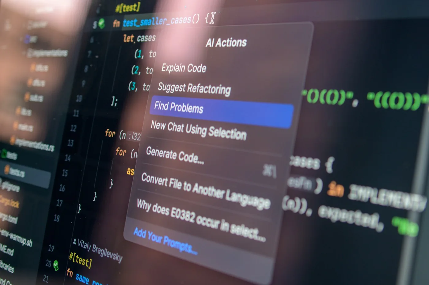 A code editor showing assisted development actions.