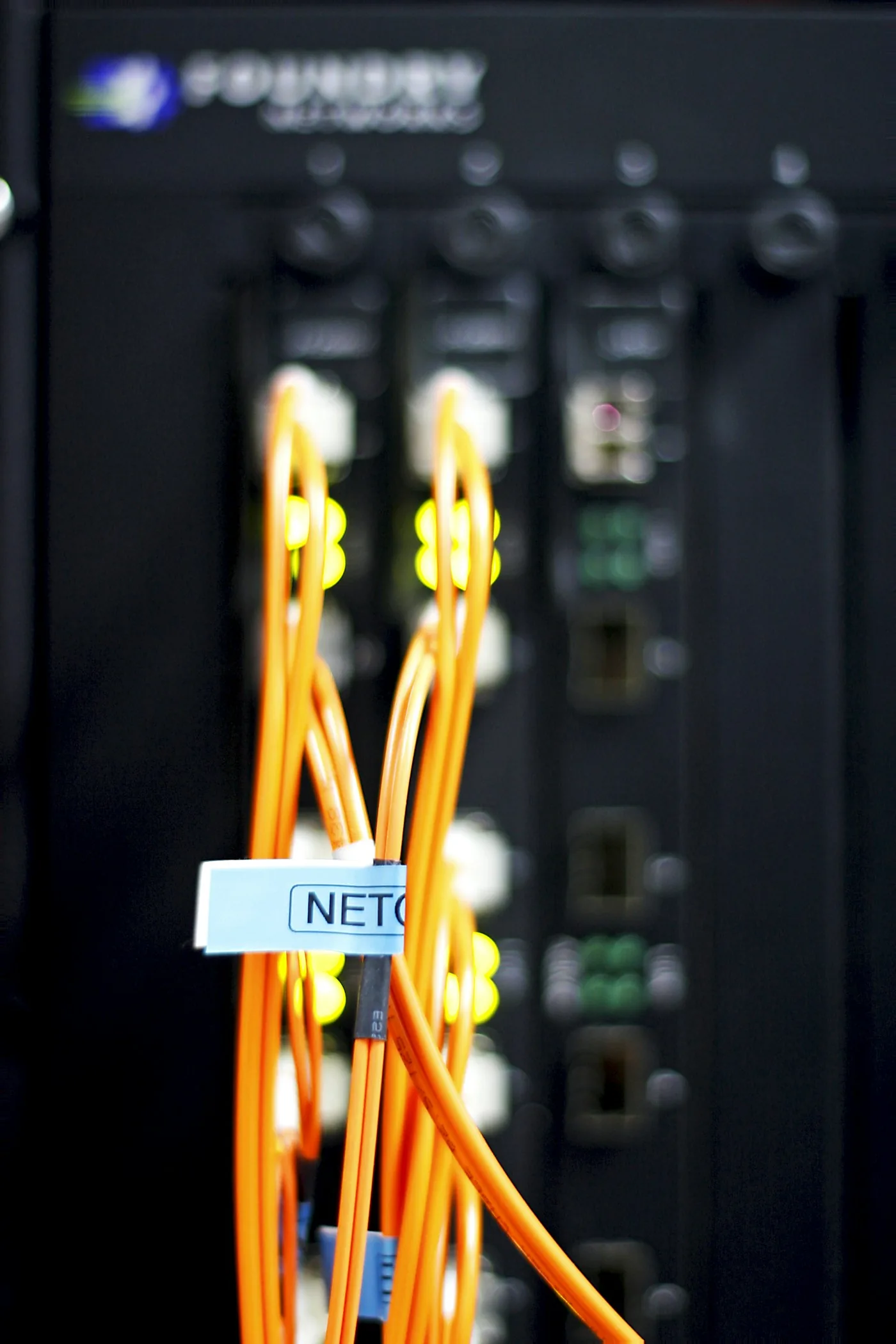 Network equipment with yellow connection cables.