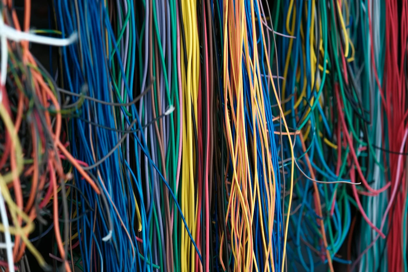 Many cables connecting a network installation.