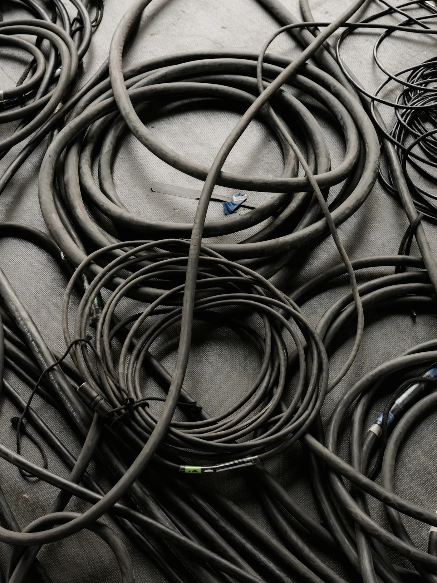 Tangled cables illustrating unmanaged connections.