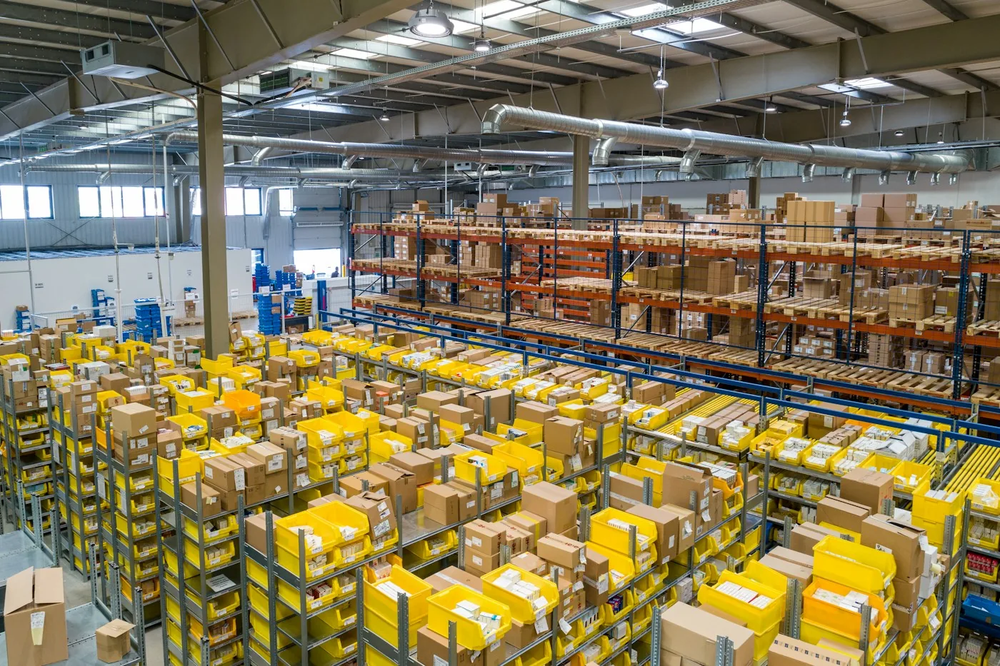 A warehouse with bins, shelves and handling infrastructure.