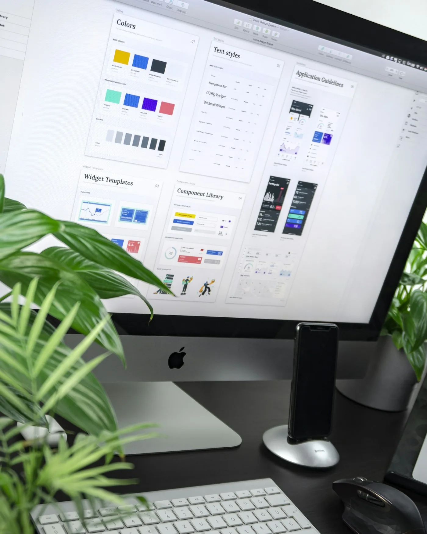 A desktop monitor displaying application designs.